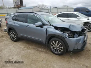 2023 Toyota Corolla Cross XLE with VIN 7MUDAABG1PV052040, listed as a Copart auction lot 51840315 with 43,228 mi miles and Salvage title. Bid and sale history available at DreamBid. Image 4.