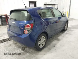 2013 Chevrolet Sonic LT with VIN 1G1JC6SB9D4252785, listed as a IAAI auction lot 41499502 with 114,924 mi miles. Bid and sale history available at carsss.com. Image 4.