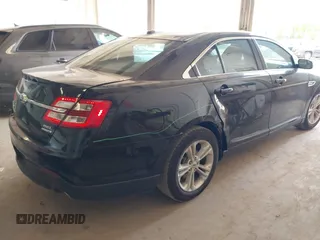 2015 Ford Taurus SEL with VIN 1FAHP2E84FG190092, listed as a IAAI auction lot 42215979 with 187,871 mi miles and . Bid and sale history available at DreamBid. Image 4.