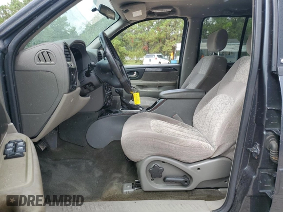 2003 GMC Envoy SLT with VIN 1GKDS13SX32255346, listed as a Copart auction lot 70420894 with 172,721 mi miles and Salvage Title. Bid and sale history available at carsss.com. Image 7.