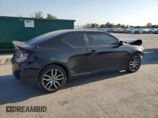 2015 Scion tC with VIN JTKJF5C79FJ003581, listed as a Copart auction lot 52973655 with 106,641 mi miles and Salvage Title. Bid and sale history available at carsss.com. Image 3.