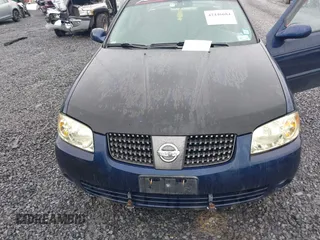 2005 Nissan Sentra S z VIN 3N1CB51D85L486835, wystawiony jako IAAI lot #42446684 z przebiegiem 99 818 mil mil oraz . Historia ofert i sprzedaży dostępna na DreamBid. Obrazek 6.