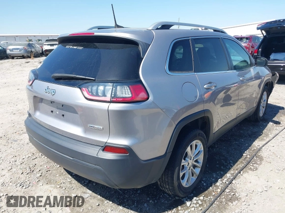 2019 Jeep Cherokee Latitude with VIN 1C4PJLCB3KD206922, listed as a IAAI auction lot 41904629 with 84,665 mi miles. Bid and sale history available at carsss.com. Image 4.