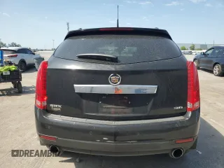 2014 Cadillac SRX Premium Collection with VIN 3GYFNDE35ES591071, listed as a Copart auction lot 57891265 with 134,560 mi miles and Salvage title. Bid and sale history available at DreamBid. Image 6.