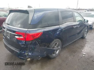 2021 Honda Odyssey EX with VIN 5FNRL6H55MB018776, listed as a IAAI auction lot 41485453 with 53,766 mi miles and . Bid and sale history available at DreamBid. Image 4.