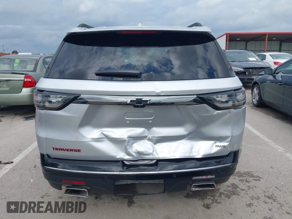 2019 Chevrolet Traverse Premier with VIN 1GNEVKKW3KJ287097, listed as a IAAI auction lot 42497740 with 72,836 mi miles and . Bid and sale history available at DreamBid. Image 16.