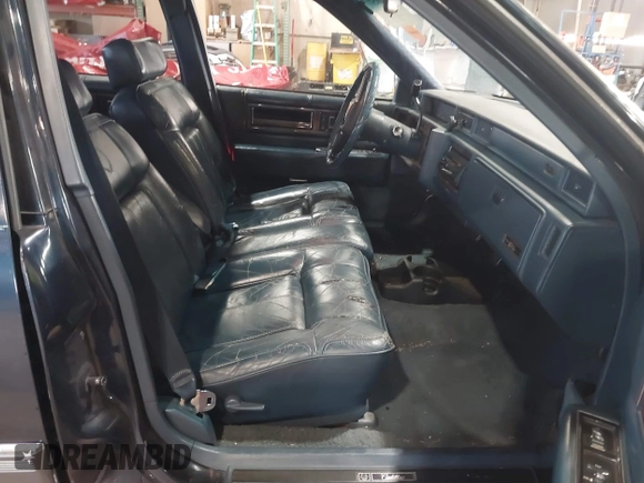1989 Cadillac DeVille z VIN 1G6CD5159K4356924, wystawiony jako IAAI lot #41526057 z przebiegiem 148 134 mil mil oraz . Historia ofert i sprzedaży dostępna na DreamBid. Obrazek 5.