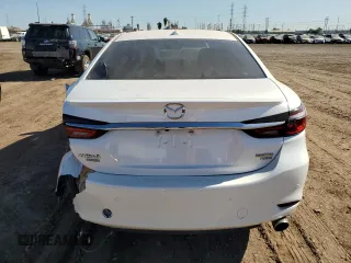 2021 Mazda 6 Signature with VIN JM1GL1XY5M1614601, listed as a Copart auction lot 73769893 with 22,617 mi miles and . Bid and sale history available at DreamBid. Image 6.