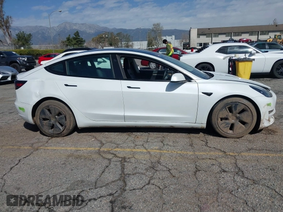 2023 Tesla Model 3 with VIN 5YJ3E1EA8PF398110, listed as a IAAI auction lot 41692006 with 112,699 mi miles and . Bid and sale history available at carsss.com. Image 13.