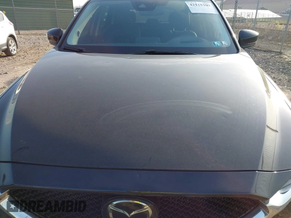 2018 Mazda CX-5 Grand Touring with VIN JM3KFBDM2J0463279, listed as a IAAI auction lot 42115309 with 68,851 mi miles. Bid and sale history available at carsss.com. Image 6.