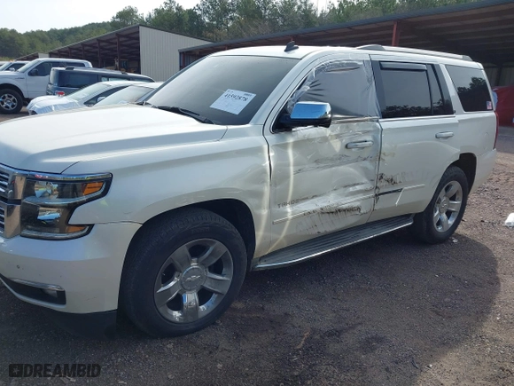 2015 Chevrolet Tahoe LTZ with VIN 1GNSCCKC2FR140524, listed as a IAAI auction lot 41592878 with 284,785 mi miles. Bid and sale history available at carsss.com. Image 2.