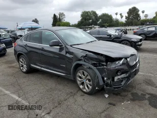 2018 BMW X4 xDrive28i z VIN 5UXXW3C57J0T82047, wystawiony jako Copart lot #55988675 z przebiegiem 103 692 mil mil oraz Szkody całkowita. Historia ofert i sprzedaży dostępna na DreamBid. Obrazek 4.