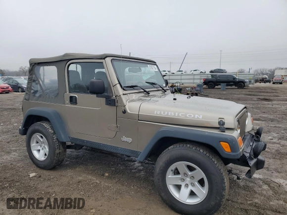 2004 Jeep Wrangler Rubicon with VIN 1J4FA69S24P743345, listed as a Copart auction lot 87067154 with 153,783 mi miles and Salvage Title. Bid and sale history available at carsss.com. Image 4.
