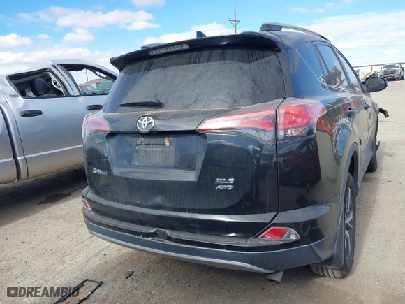 2017 Toyota RAV4 XLE with VIN 2T3RFREV9HW567801, listed as a IAAI auction lot 41053316 with 103,267 mi miles. Bid and sale history available at carsss.com. Image 17.