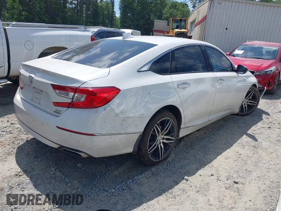 2021 Honda Accord Touring with VIN 1HGCV2F98MA015203, listed as a IAAI auction lot 42313124 with 55,530 mi miles and . Bid and sale history available at DreamBid. Image 4.