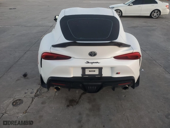 2020 Toyota GR Supra 3.0 with VIN WZ1DB4C01LW024857, listed as a Copart auction lot 86454564 with 0 mi miles and Salvage Title. Bid and sale history available at carsss.com. Image 6.