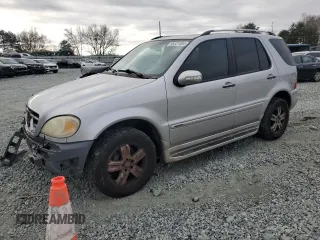 2005 Mercedes-Benz M 500 with VIN 4JGAB75E35A532559, listed as a Copart auction lot 85321484 with 305,999 mi miles and Salvage Title. Bid and sale history available at DreamBid. Image 1.