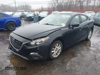 2014 Mazda 3 i Grand Touring with VIN JM1BM1W79E1155302, listed as a IAAI auction lot 41512501 with 98,635 mi miles and . Bid and sale history available at DreamBid. Image 20.