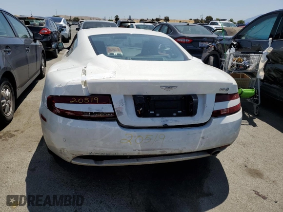 2009 Aston Martin DB9 z VIN SCFAD01E59GA10941, wystawiony jako Copart lot #57220313 z przebiegiem 24 818 mil mil oraz . Historia ofert i sprzedaży dostępna na DreamBid. Obrazek 6.