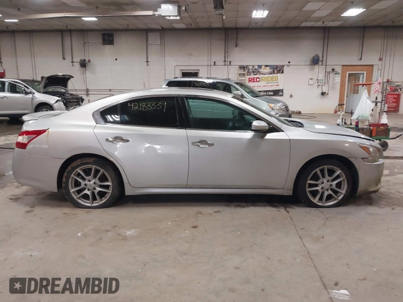 2011 Nissan Maxima SV with VIN 1N4AA5AP4BC802777, listed as a IAAI auction lot 42183339 with 164,807 mi miles and . Bid and sale history available at DreamBid. Image 14.