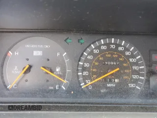 1991 Toyota Camry DLX z VIN 4T1SV21E7MU414824, wystawiony jako Copart lot #61604434 z przebiegiem 170 867 mil mil oraz Szkoda całkowita • Salvage title. Historia ofert i sprzedaży dostępna na DreamBid. Obrazek 9.