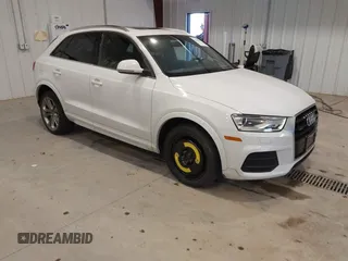 2016 Audi Q3 Premium Plus with VIN WA1EFCFS2GR015940, listed as a IAAI auction lot 41243107 with 91,538 mi miles. Bid and sale history available at carsss.com. Image 1.