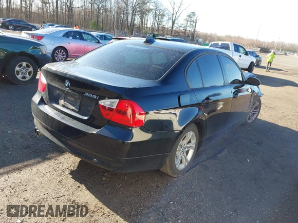 2008 BMW 3 Series 328i with VIN WBAVA37568NL55529, listed as a IAAI auction lot 41832053 with 134,933 mi miles. Bid and sale history available at carsss.com. Image 4.