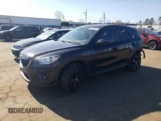 2015 Mazda CX-5 Touring with VIN JM3KE4CY5F0453789, listed as a Copart auction lot 53401615 with 204,305 mi miles and Salvage Title. Bid and sale history available at carsss.com. Image 1.