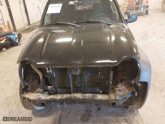 2004 Jeep Liberty Sport with VIN 1J4GL48K44W221827, listed as a IAAI auction lot 41691349 with 157,642 mi miles. Bid and sale history available at carsss.com. Image 6.