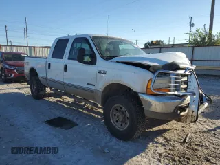 1999 Ford Super Duty F-250 XL with VIN 1FTNW21F6XEC74075, listed as a Copart auction lot 52581155 with 118,630 mi miles and Salvage Title. Bid and sale history available at carsss.com. Image 4.