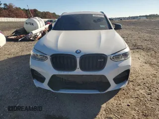 2021 BMW X4 M z VIN 5YMUJ0C00M9E94527, wystawiony jako Copart lot #69607414 z przebiegiem Nie podano mil oraz Szkoda całkowita • Salvage title. Historia ofert i sprzedaży dostępna na DreamBid. Obrazek 5.