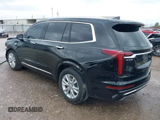 2023 Cadillac XT6 FWD Luxury with VIN 1GYKPAR44PZ114020, listed as a IAAI auction lot 41669115 with 110,305 mi miles. Bid and sale history available at carsss.com. Image 3.