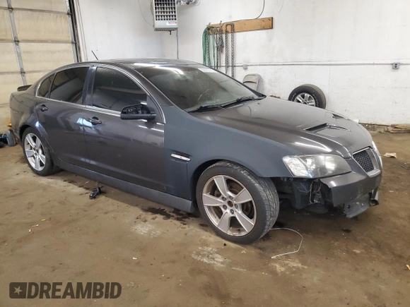 2009 Pontiac G8 z VIN 6G2ER57739L205634, wystawiony jako Copart lot #58935145 z przebiegiem 181 490 mil mil oraz Czysty tytuł • Clean title. Historia ofert i sprzedaży dostępna na DreamBid. Obrazek 4.