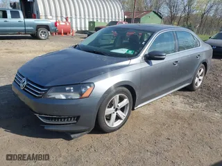 2013 Volkswagen Passat SE with VIN 1VWBP7A36DC039148, listed as a IAAI auction lot 42075823 with 196,734 mi miles. Bid and sale history available at carsss.com. Image 2.