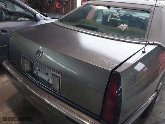 1999 Cadillac Eldorado ESC with VIN 1G6EL12Y8XU612393, listed as a IAAI auction lot 41761839 with 104,994 mi miles. Bid and sale history available at carsss.com. Image 6.
