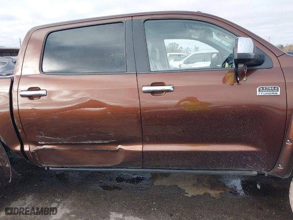 2014 Toyota Tundra 4WD Truck Platinum with VIN 5TFAW5F18EX411578, listed as a IAAI auction lot 41108462 with 150,873 mi miles. Bid and sale history available at carsss.com. Image 13.