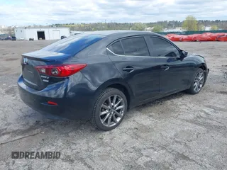 2018 Mazda 3 Touring with VIN 3MZBN1V35JM201844, listed as a IAAI auction lot 42051674 with 75,932 mi miles and . Bid and sale history available at DreamBid. Image 4.
