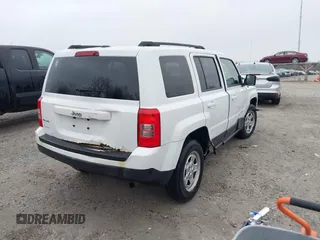 2014 Jeep Patriot Sport with VIN 1C4NJRBB1ED744101, listed as a IAAI auction lot 42009390 with 180,214 mi miles. Bid and sale history available at carsss.com. Image 4.