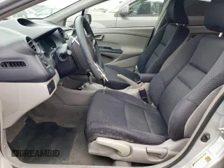 2010 Honda Insight EX with VIN JHMZE2H71AS039108, listed as a Copart auction lot 54557145 with 151,230 mi miles and Salvage title. Bid and sale history available at DreamBid. Image 7.