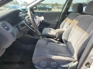 1999 Honda Accord LX z VIN 1HGCG5647XA024074, wystawiony jako Copart lot #56057575 z przebiegiem Nie podano mil oraz Szkoda całkowita • Salvage title. Historia ofert i sprzedaży dostępna na DreamBid. Obrazek 7.