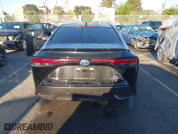 2022 Toyota Mirai XLE with VIN JTDAAAAA9NA007013, listed as a IAAI auction lot 41744965 with 23,243 mi miles and . Bid and sale history available at DreamBid. Image 16.