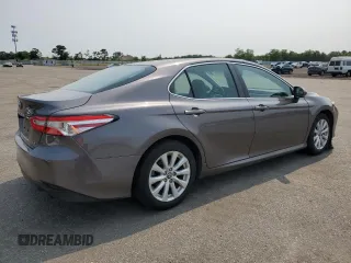 2018 Toyota Camry LE with VIN 4T1B11HK1JU141022, listed as a Copart auction lot 60135785 with 112,652 mi miles and Salvage title. Bid and sale history available at DreamBid. Image 3.