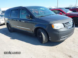 2011 Chrysler Town & Country Touring-L with VIN 2A4RR8DG1BR645357, listed as a IAAI auction lot 41770340 with 144,087 mi miles. Bid and sale history available at carsss.com. Image 1.