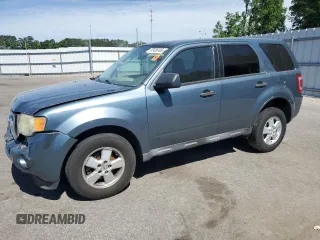 2010 Ford Escape XLS with VIN 1FMCU0C73AKD07061, listed as a Copart auction lot 57426105 with 145,805 mi miles and Salvage title. Bid and sale history available at DreamBid. Image 1.