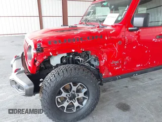 2021 Jeep Wrangler Unlimited Rubicon z VIN 1C4HJXFG8MW785318, wystawiony jako IAAI lot #42118969 z przebiegiem 61 572 mil mil oraz . Historia ofert i sprzedaży dostępna na DreamBid. Obrazek 6.