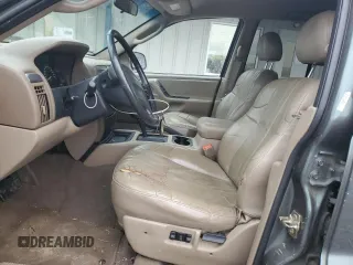 2002 Jeep Grand Cherokee z VIN 1J4GX38S72C152046, wystawiony jako Copart lot #57963095 z przebiegiem 204 576 mil mil oraz Szkoda całkowita • Salvage title. Historia ofert i sprzedaży dostępna na DreamBid. Obrazek 7.