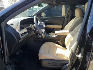 2024 Cadillac XT4 FWD Luxury with VIN 1GYAZAR46RF222794, listed as a Copart auction lot 47047765 with 0 mi miles and Salvage Title. Bid and sale history available at carsss.com. Image 7.