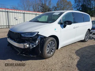 2024 Chrysler Pacifica Hybrid Select z VIN 2C4RC1S72RR169292, wystawiony jako IAAI lot #41308587 z przebiegiem 278 mil mil oraz . Historia ofert i sprzedaży dostępna na DreamBid. Obrazek 18.