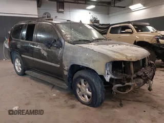 2007 GMC Envoy SLE with VIN 1GKDT13S872298442, listed as a IAAI auction lot 41343565 with 106,818 mi miles. Bid and sale history available at carsss.com. Image 6.