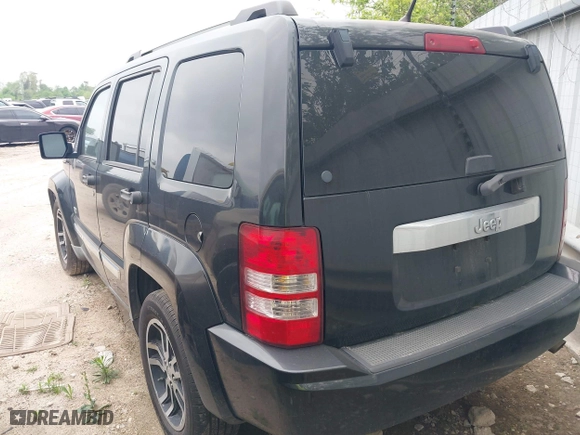 2011 Jeep Liberty Sport with VIN 1J4PP2GK0BW559054, listed as a IAAI auction lot 41642092 with 273,927 mi miles. Bid and sale history available at carsss.com. Image 3.